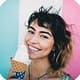 Girl eating white ice cream cone